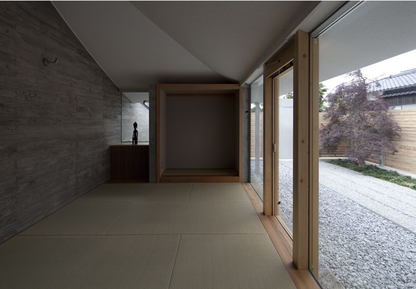 Broken Pitched Roof House / NKS Architects