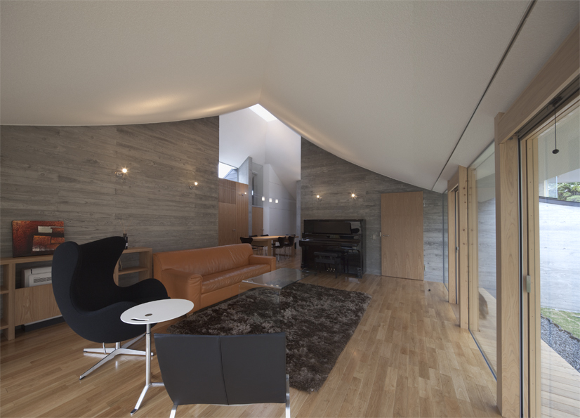 Broken Pitched Roof House / NKS Architects