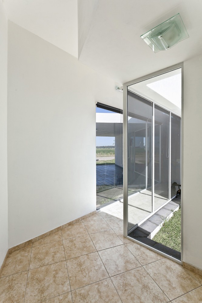 Fiore House / Cekada-Romanos Arquitectos