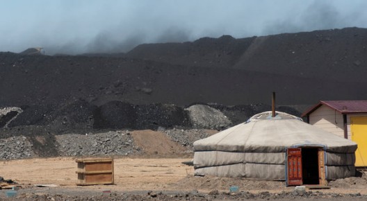 © Gilles Sabrie for The New York Times. Coal mounds in Gobi, Mongolia