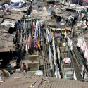 Slum Rehabilitation Promise to Mumbai's 20 Million Slum Rehabilitation Promise to Mumbai's 20 Million Dhobi Ghat, Mumbai, India; Courtesy of Flickr User Laertes; Licensed via Creative Commons