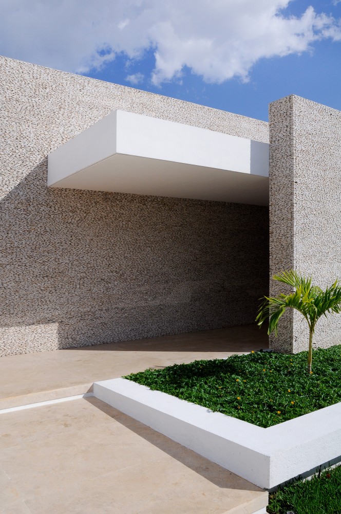 Rajuela House / Muñoz Arquitectos