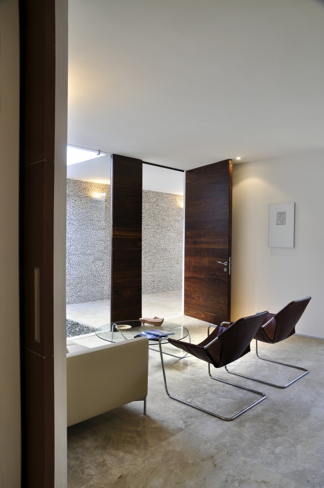 Rajuela House / Muñoz Arquitectos