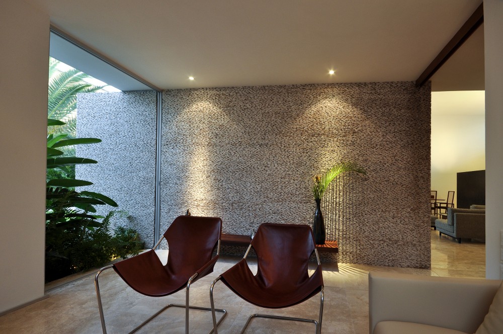 Rajuela House / Muñoz Arquitectos