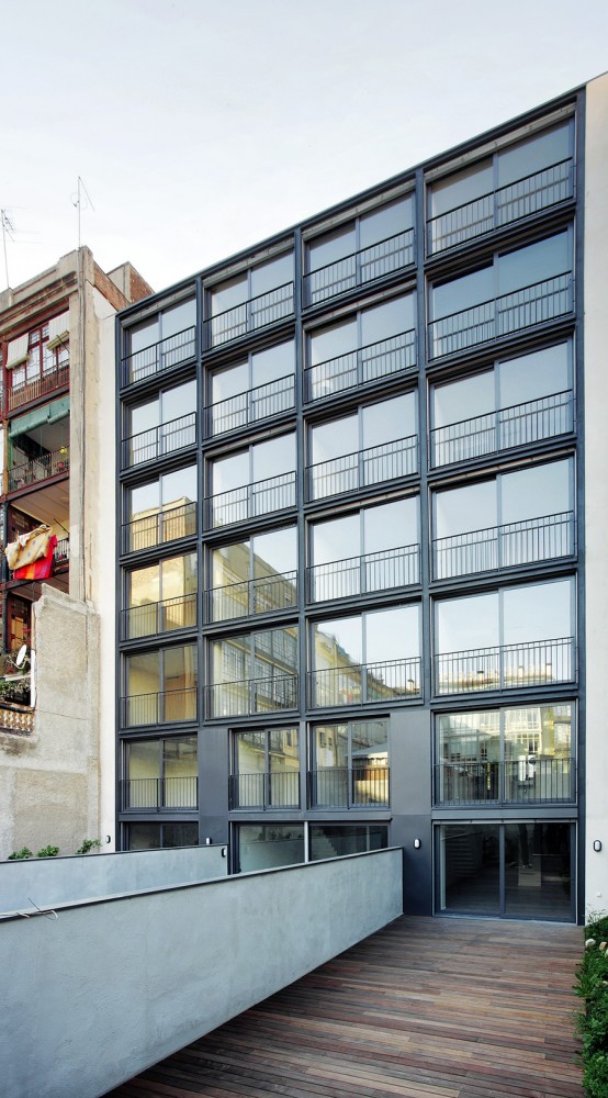 Apartment Building CASP 74 / Bach Arquitectes