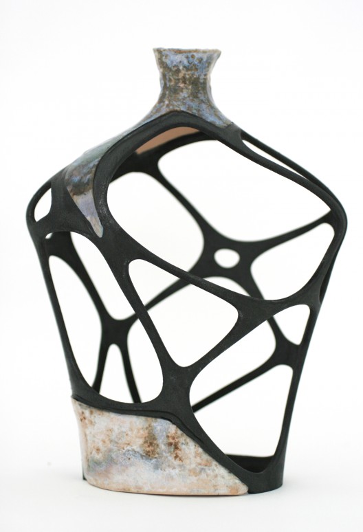 A digitally restored broken vase, glazed ceramic, SLS nylon element, epoxy glue and black spray paint, 2010. (© Amit Zoran)