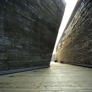 Amateur Architecture Studio. Ningbo History Museum, 2003-2008. Ningbo, China. Photo by Lv Hengzhong.