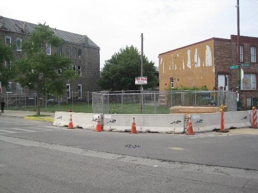 Chicago lines Blue Island Avenue with the new cement. Via Design Build Source