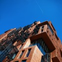 Red Apple Apartment Building / Aedes Studio Red Apple Apartment Building / Aedes Studio Courtesy of Aedes Studio
