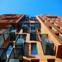 Red Apple Apartment Building / Aedes Studio Red Apple Apartment Building / Aedes Studio Courtesy of Aedes Studio