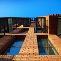 Red Apple Apartment Building / Aedes Studio Red Apple Apartment Building / Aedes Studio Courtesy of Aedes Studio