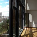 Red Apple Apartment Building / Aedes Studio Red Apple Apartment Building / Aedes Studio Courtesy of Aedes Studio