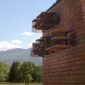 Red Apple Apartment Building / Aedes Studio Red Apple Apartment Building / Aedes Studio Courtesy of Aedes Studio