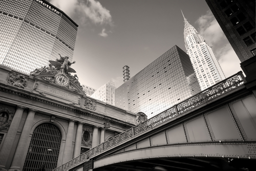 Grand Central Station (1913) in front of the MetLife (formerly Pan Am Building, 1963) and next to the Chrysler Building (1930). Image Courtesy of emin kuliyev / Shutterstock.com