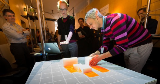 Stefan Müller adjusts the position of a building while a real-time project overlays simulated shadows. Photo courtesy of Bentley