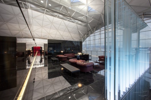 The lounges at Hong Kong International Airport, also designed by Foster + Partners. Image © John Nye