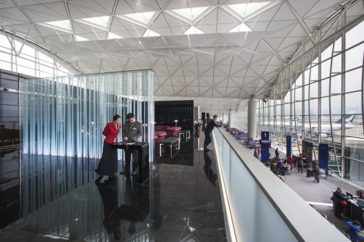The lounges at Hong Kong International Airport, also designed by Foster + Partners. Image © John Nye