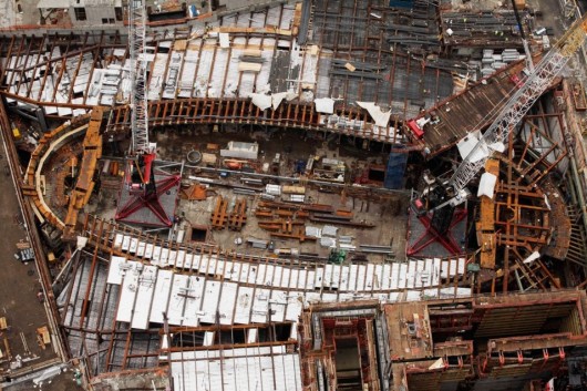 Cranes over the Transport Hub in July of 2012. Image © Mark Lennihan, AP
