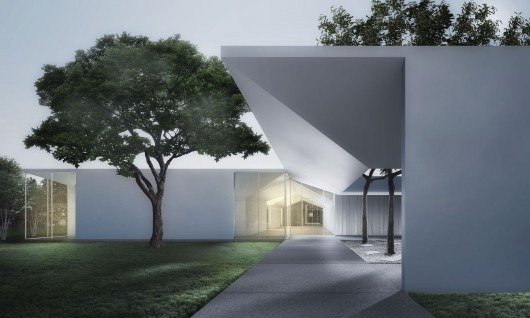 Menil Drawing Institute at dusk, looking past the west entrance courtyard. Image Courtesy of Johnston Marklee / The Menil Collection