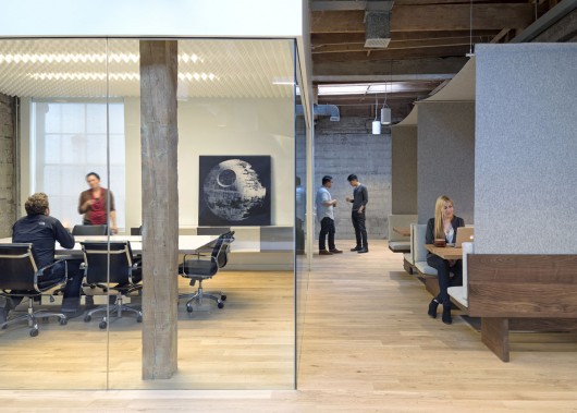 The Giant Pixel Corporation: This software development company in San Francisco occupies three tight floors of largely open-plan space. “We tried to provide different levels of acoustical privacy,” says O+A cofounder Denise Cherry. “The fully enclosed conference room is for confidential conversations, but you also have in-between spaces, like the canopied cabanas, which are connected to the work area—connected to the open plan—but still have some acoustic and even some visual separation.” Conference room ceiling made of recording-studio foam manufactured by Auralex. Image © Jasper Sanidad