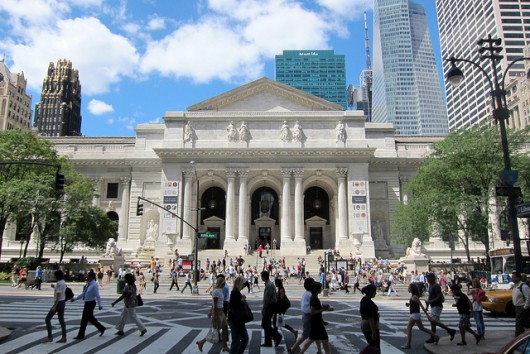 The New York Public Library’s (NYPL) main building on Fifth Avenue, is a Beaux-Arts masterpiece designed by architects Carrère & Hastings. Image via Flickr User CC wallyg.