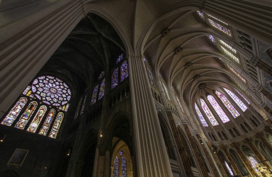 On the left, an as-yet unrestored section of the cathedral can be compared to a restored section, right. Image © Flickr CC User Lawrence OP