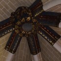 A gilded boss at the top of a vault. Image © Flickr CC User Klaus Wagensonner