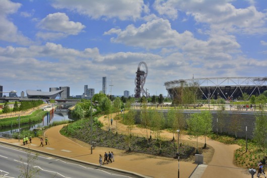 London’s Queen Elizabeth Olympic Park featuring, from left to right, Zaha Hadid-_-s Aquatics Centre, the ArcelorMittal Orbit, and the Olympic Stadium by Populous. The Olympicopolis site is on the far left. Image © Flickr CC user Martin Pettitt