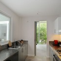 Modern Tube House  / MimANYSTUDIO  + REAL Courtesy of MimANYSTUDIO