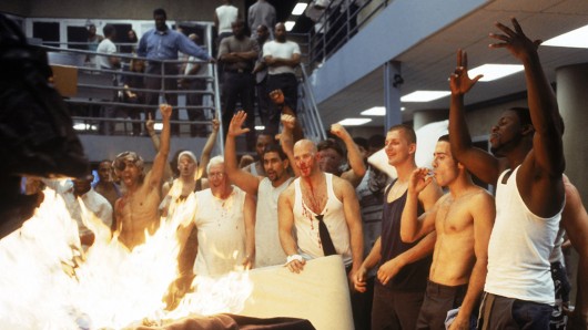 Even in more realistic series such as Oz, prisons are presented as brutal places to be. Image © Home Box Office