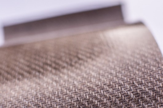 The flax-based biocomposite material used in the facade panel. Image © GXN