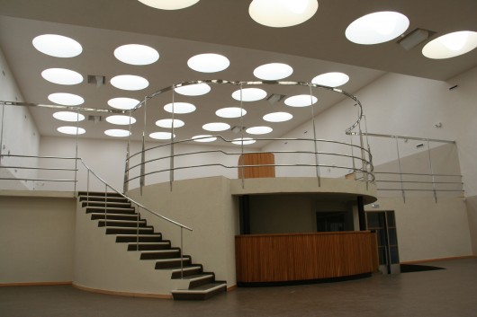 The central circulation desk under Aalto's classic skylights during renovations. Image © Flickr user Liz Waytkus